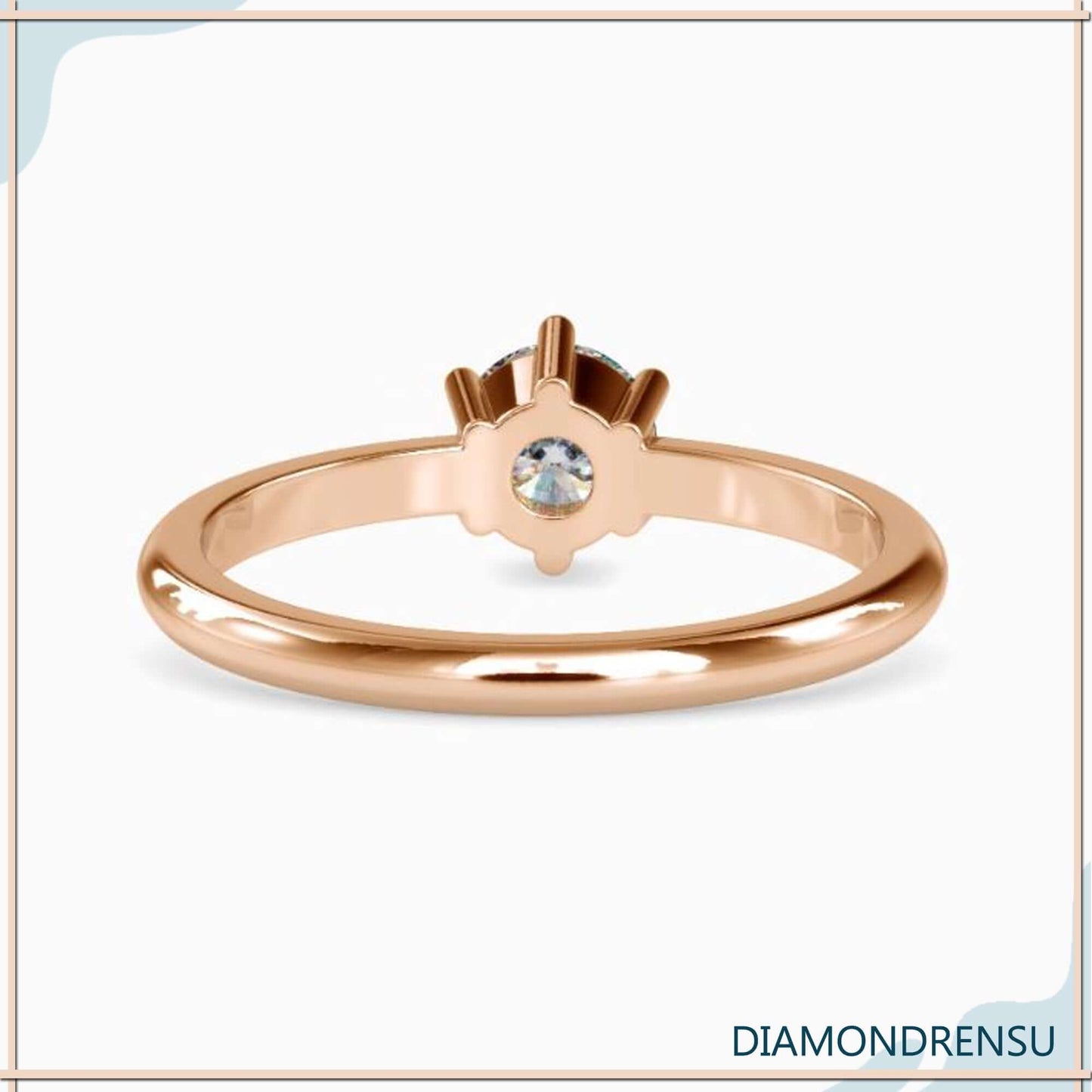 Timeless gold solitaire engagement ring with a six prong setting for extra security.