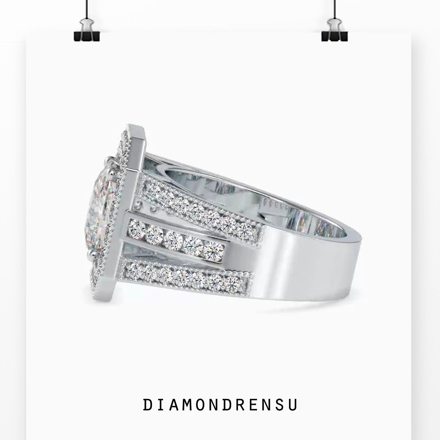 Handmade vintage ring featuring a cushion cut diamond in a prong setting.