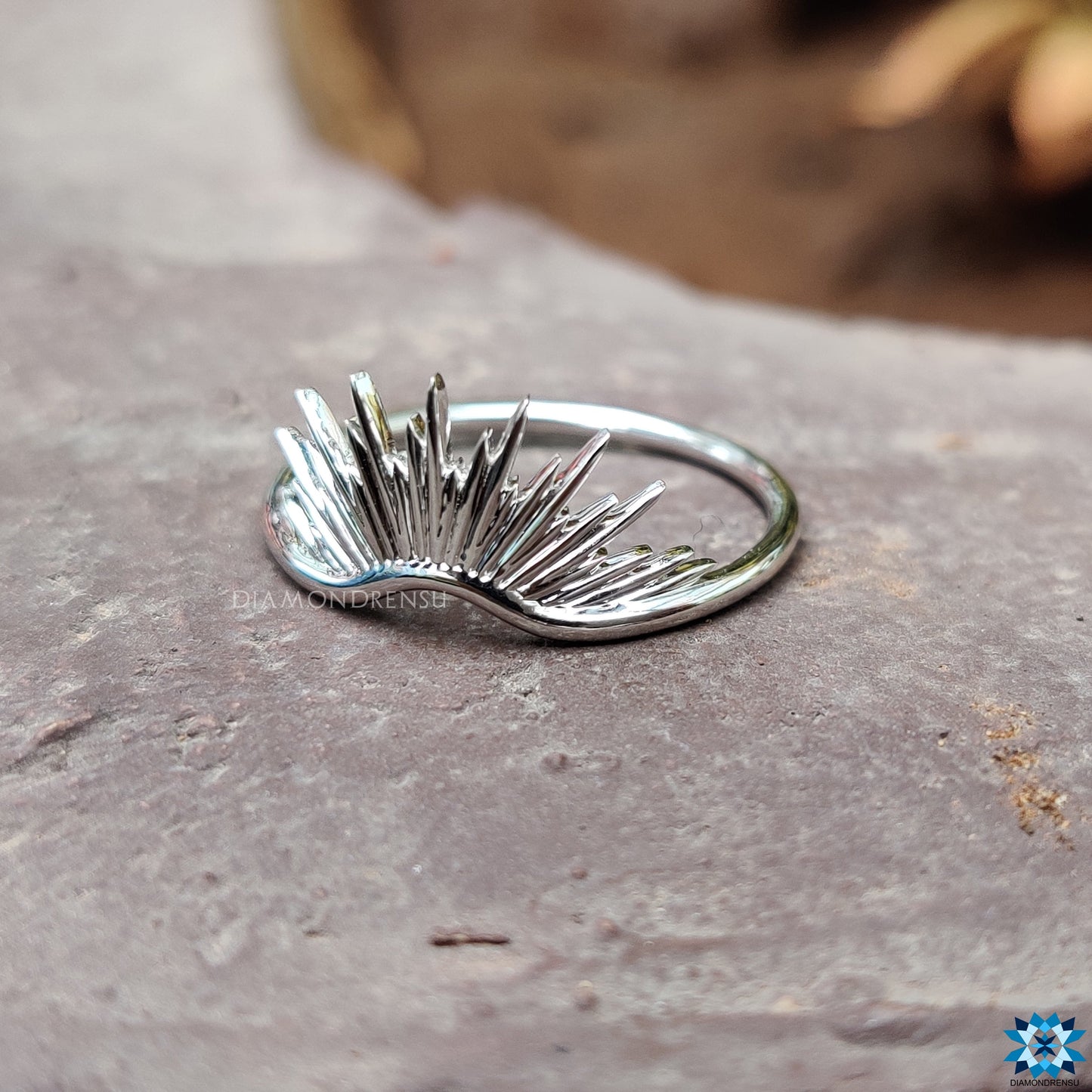 Curved antique wedding band with intricate detailing for vintage
charm.