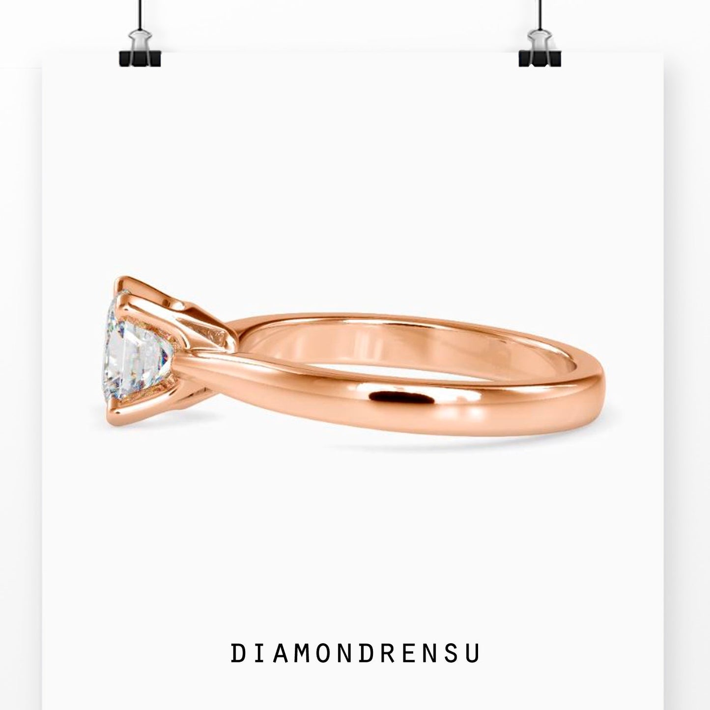 Tapered shank ring with a princess cut diamond in a white gold setting