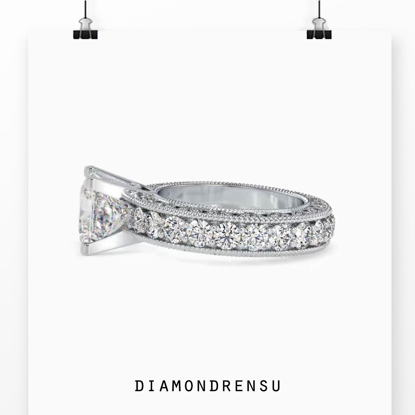 Lab grown diamond ring with a pave setting in white gold.