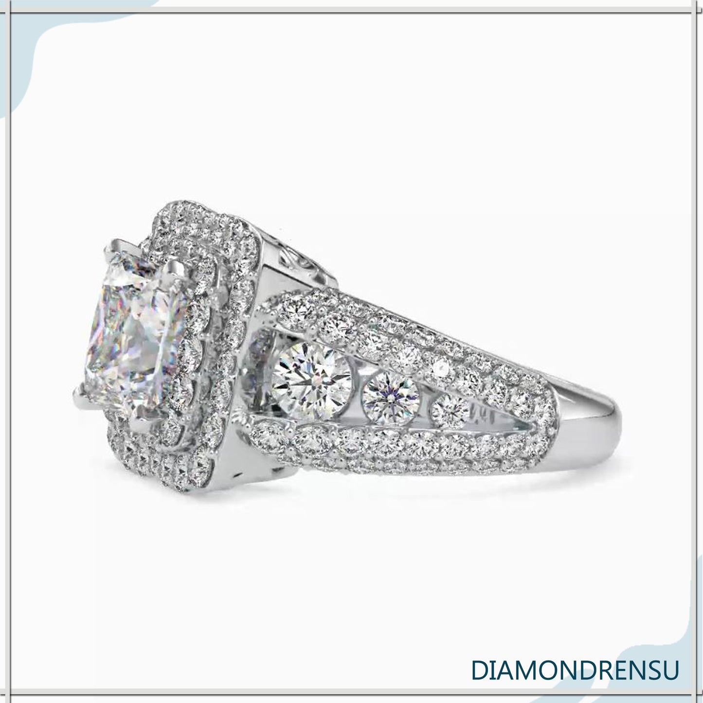 Engagement ring with side stones enhancing the beauty of the princess cut diamond.