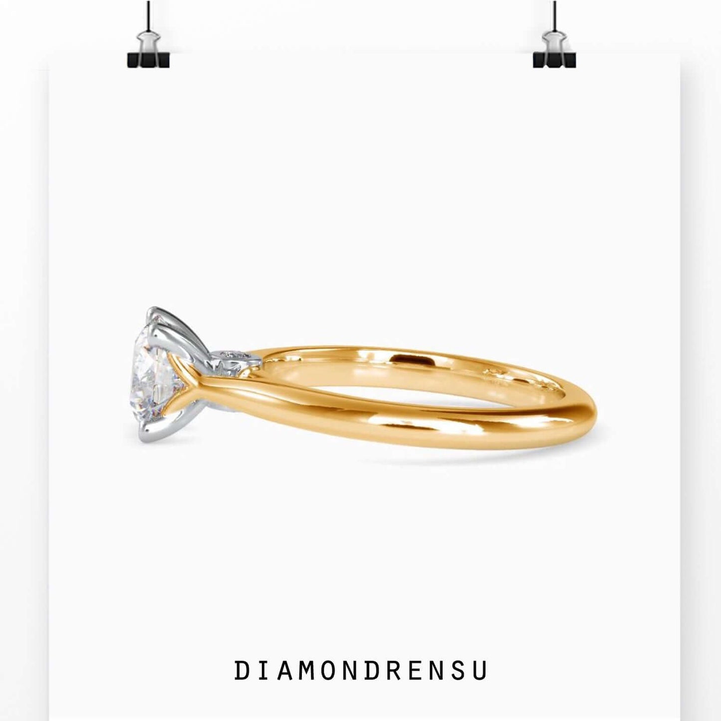Round brilliant cut diamond ring with a knife edge band, blending minimalist design with DiamondRensuās craftsmanship.