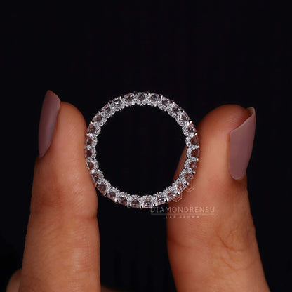 Close-up of a radiant cut wedding ring with round prong setting