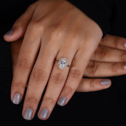Detailed shot of milgrain work on the band of a vintage engagement ring, adding a textured finish.