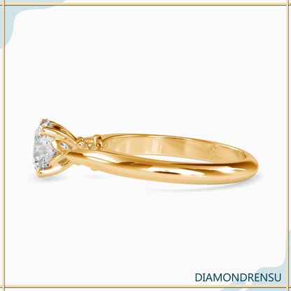 Round solitaire ring with a beautiful knife edge setting for modern elegance.