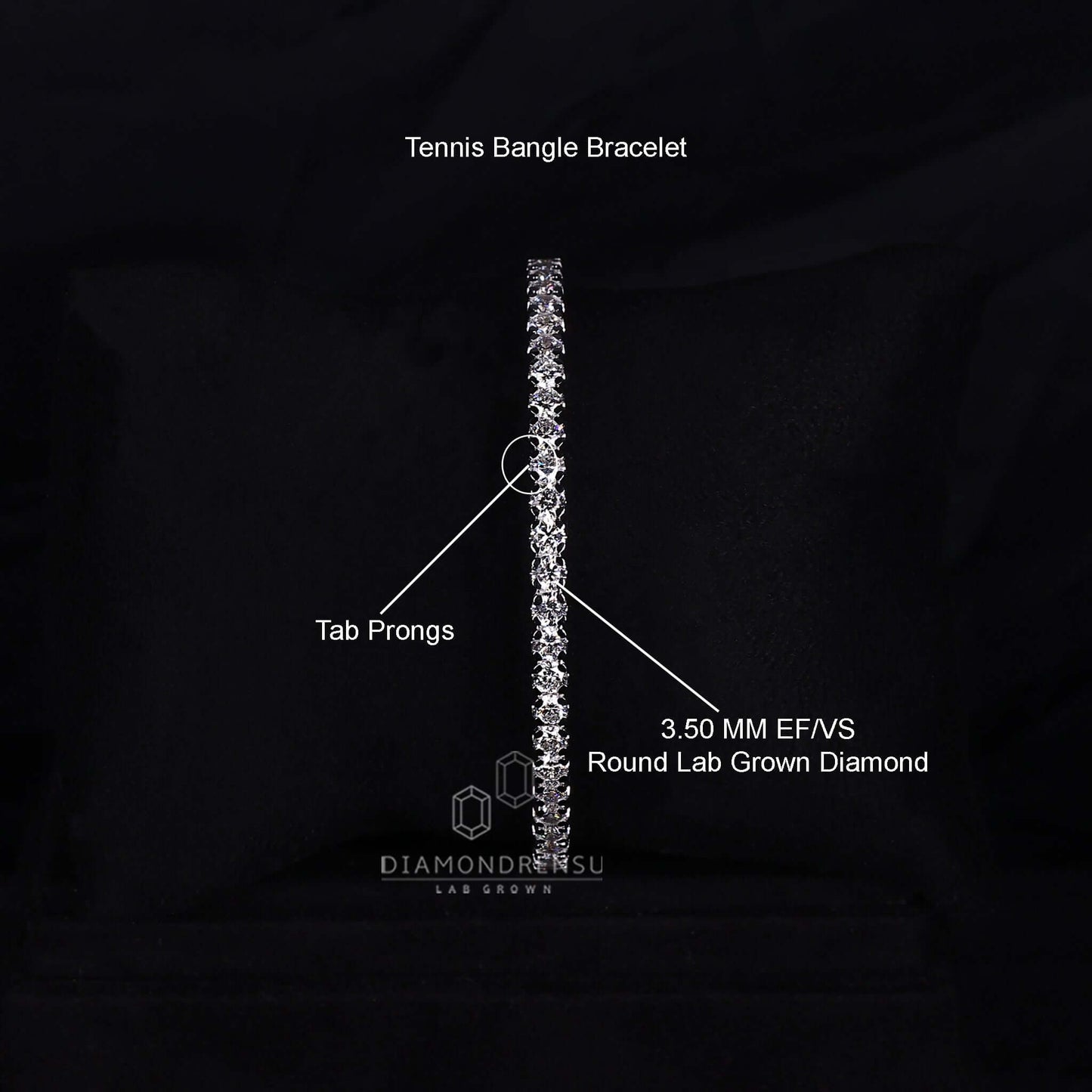 Detailed view of tab prongs on a round diamond bangle bracelet
