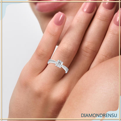 2 carat round diamond ring in a pave engagement ring setting for added sparkle.
