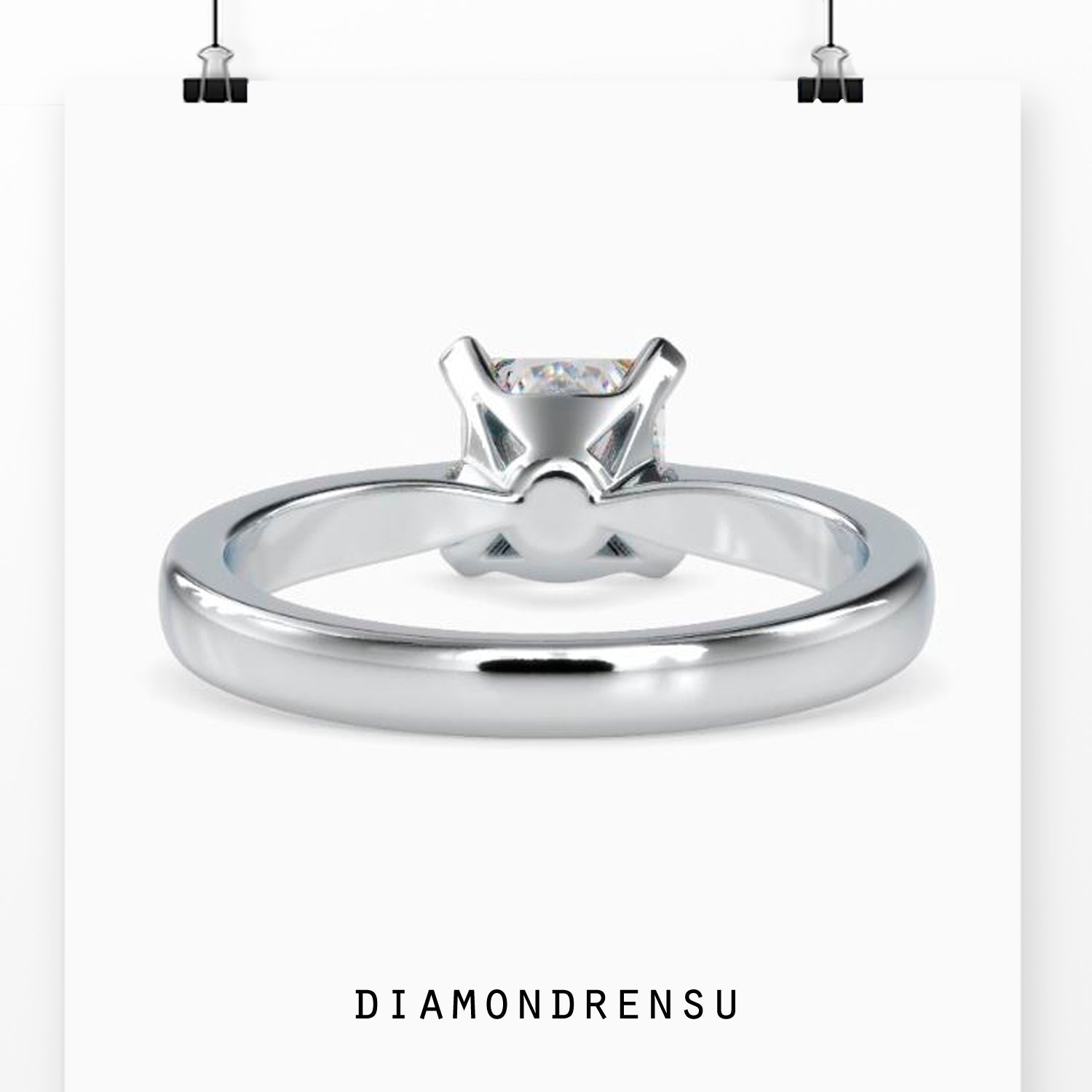 Simple gold ring with princess cut diamond and lab grown diamond accents
