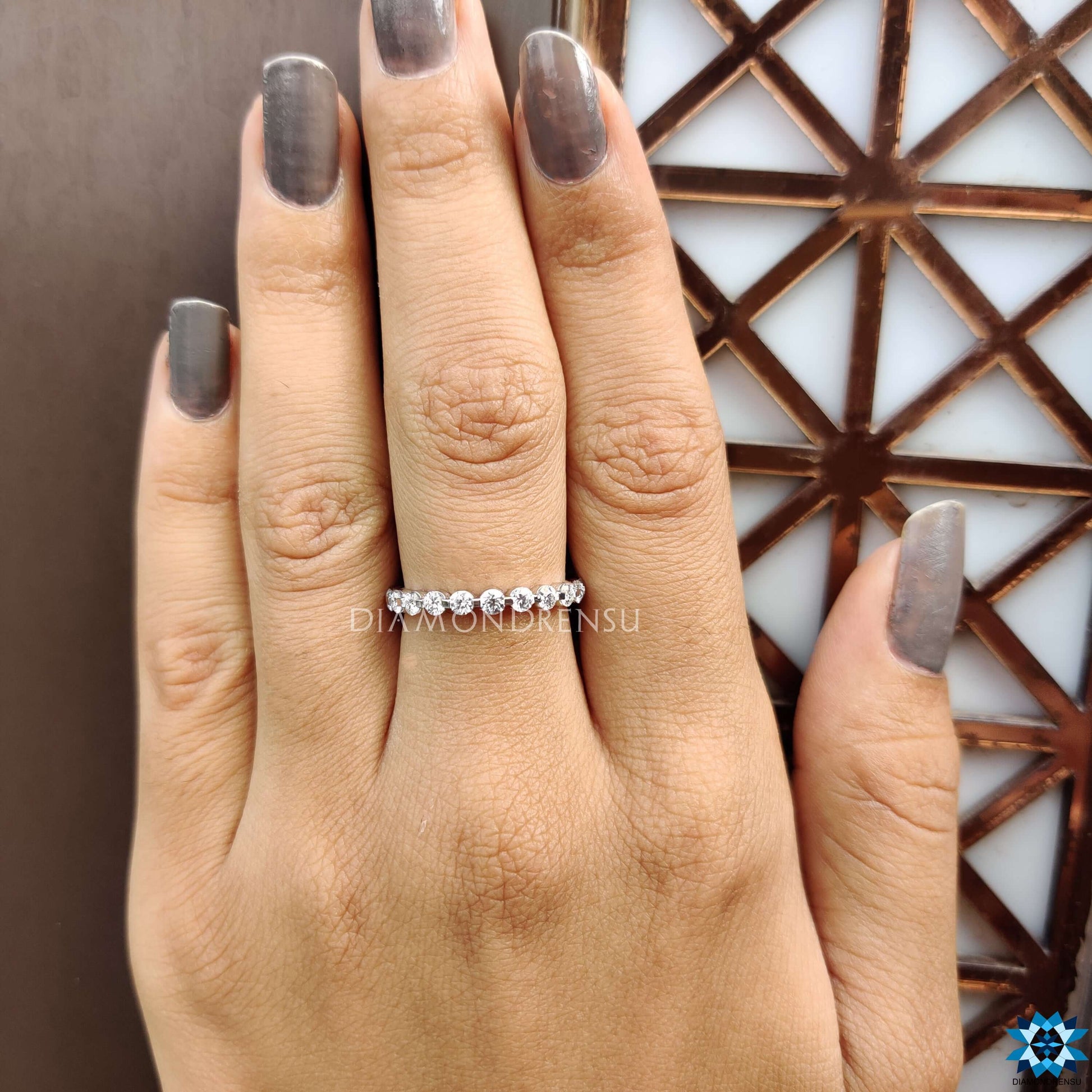 Elegant women band designed with sparkling moissanite stones for a timeless look.
