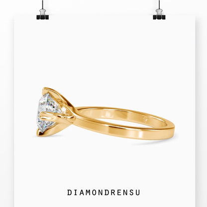 2 carat round cut diamond ring with a chic and modern twist.
