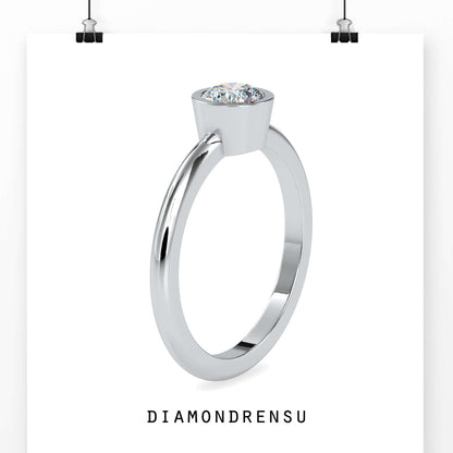 Beautiful bezel setting ring with a single diamond for a minimalist look.
