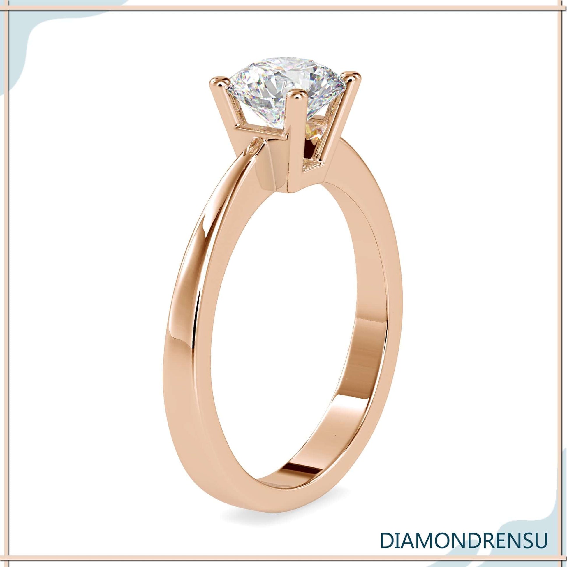 Handmade diamondrensu engagement ring featuring a basket setting and IGI certified diamond.