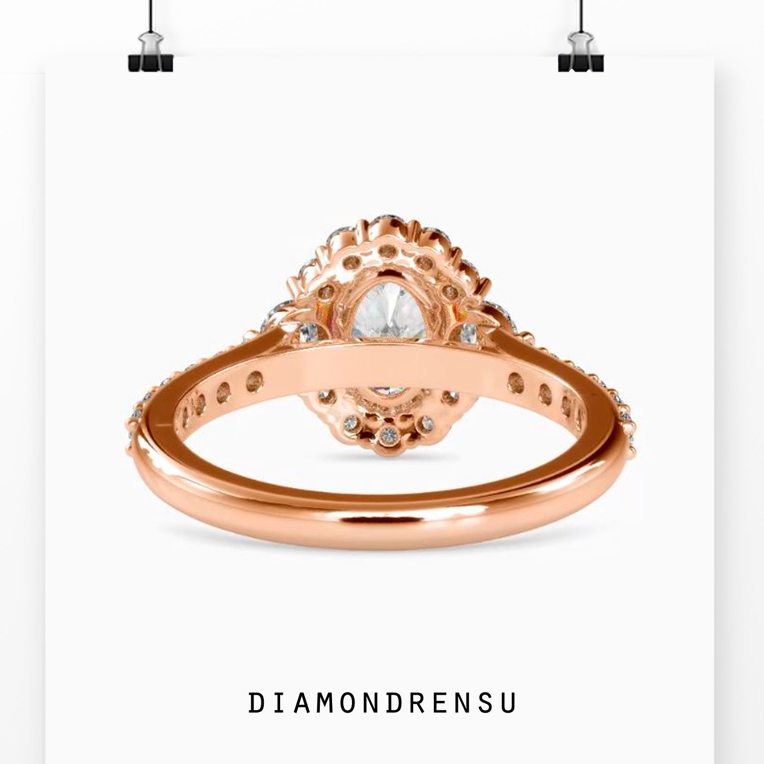 Four prong engagement ring with three stone design in white gold