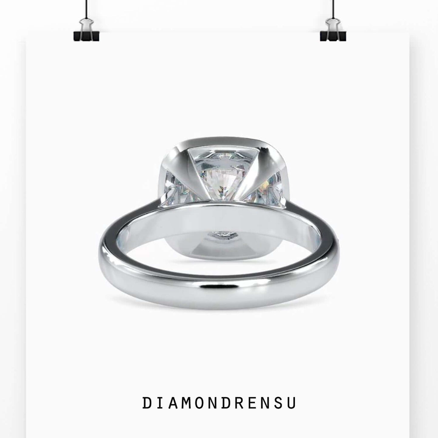 Elegant channel setting ring with a cushion cut halo for a luxurious look.
