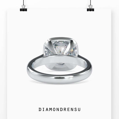 Elegant channel setting ring with a cushion cut halo for a luxurious look.
