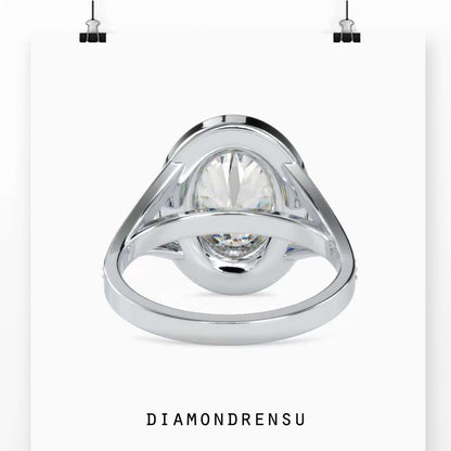 Diamond pave ring with oval diamond and prong setting for added sparkle
