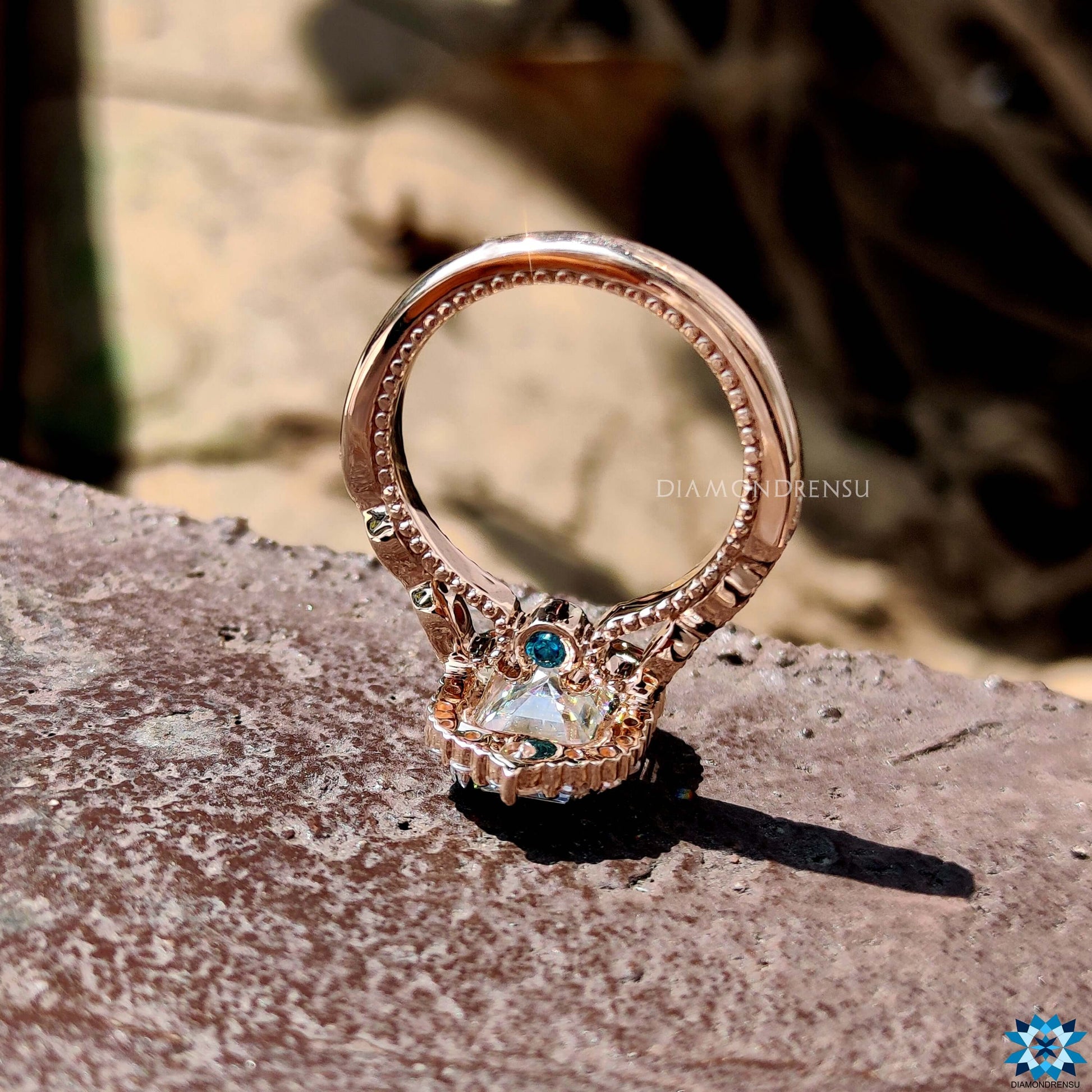 A radiant halo engagement ring featuring a sparkling moissanite center stone, adding an extra touch of brilliance.