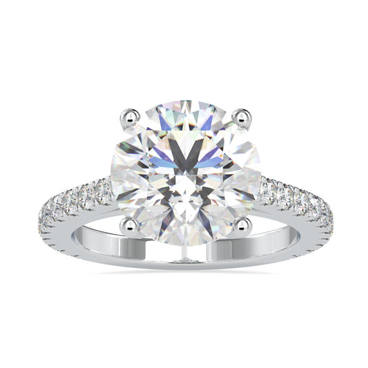 Round diamond engagement ring with a cathedral setting and 2 carat round diamond.
