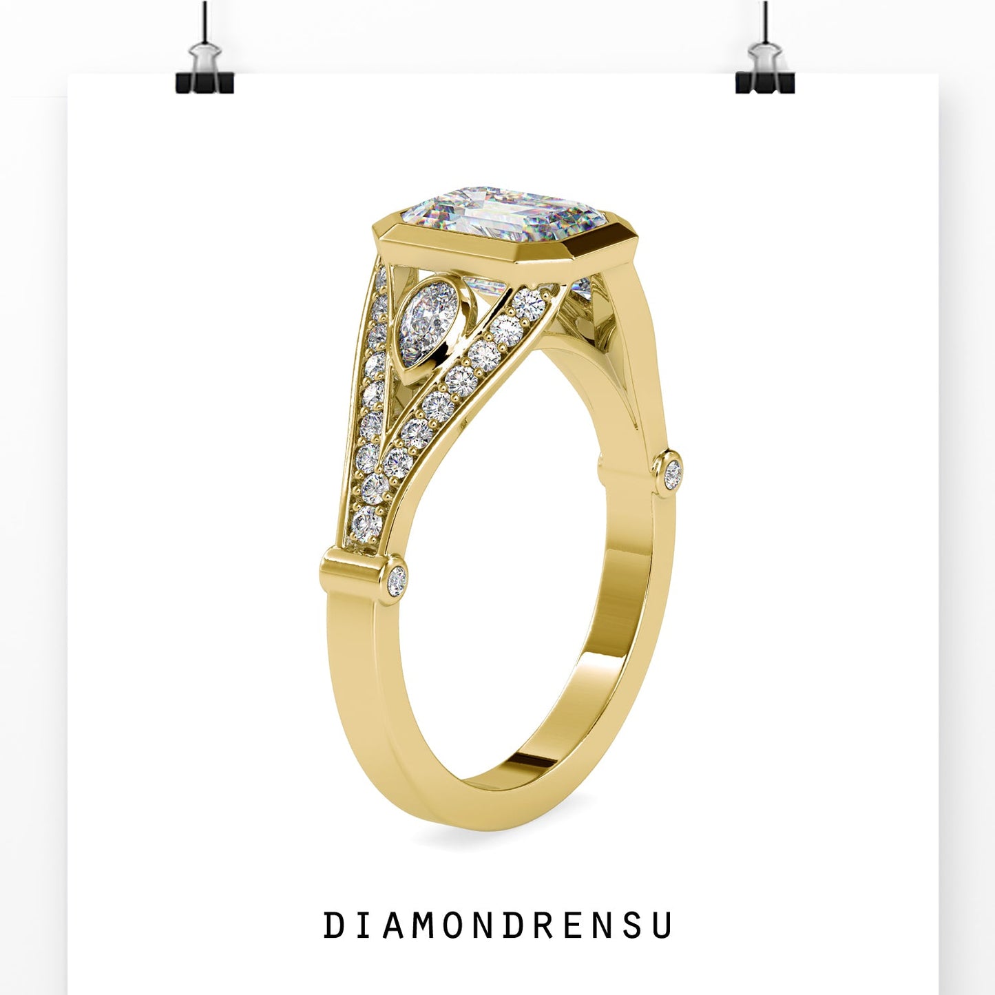 Engagement ring with pave and emerald cut diamond in a handmade design
