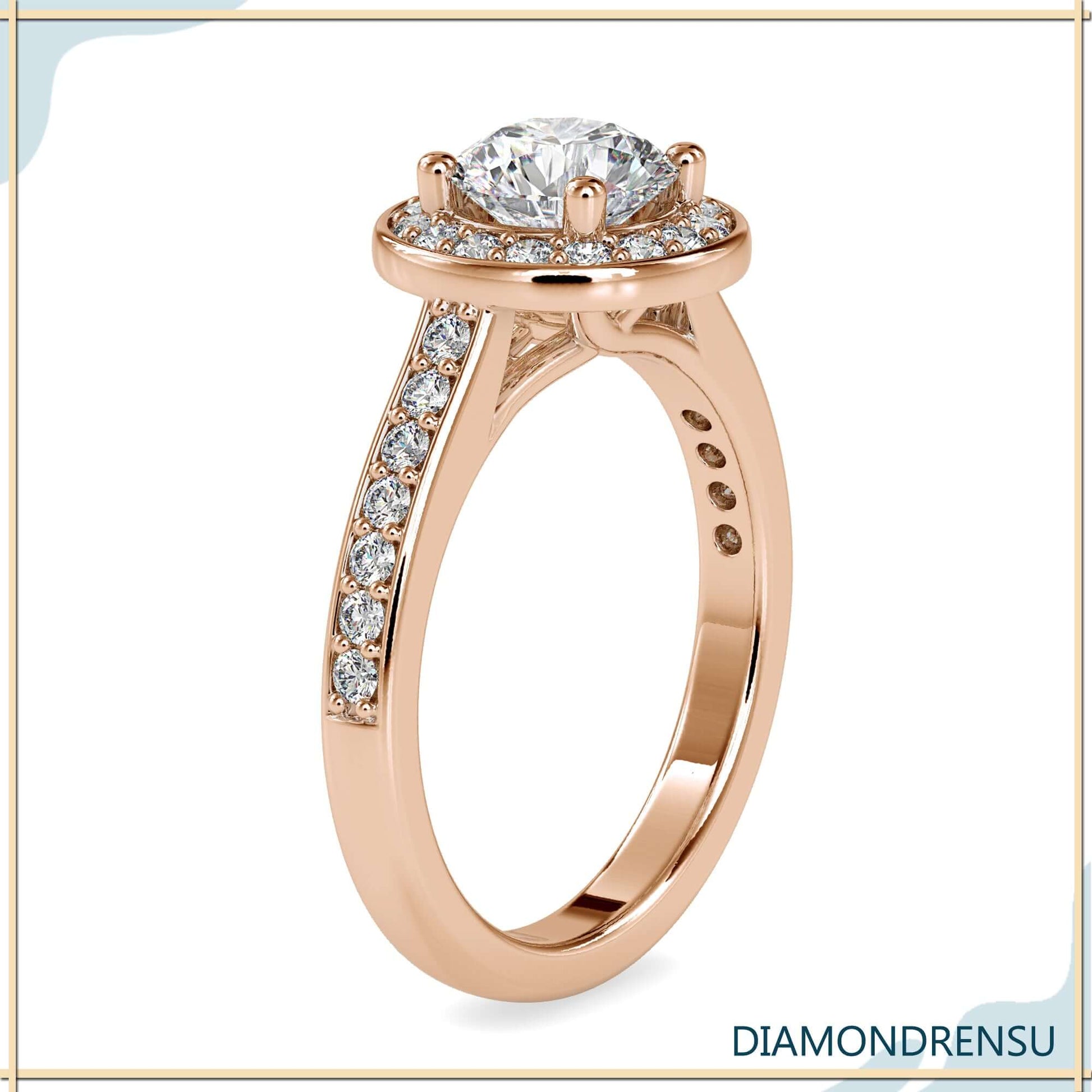 Beautiful engagement ring with halo crafted in a cathedral setting ring design.
