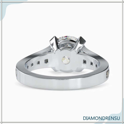 Handcrafted diamondrensu engagement ring featuring a Lab Grown Diamond and tapered pave setting.
