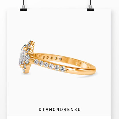 Three stone diamond ring with oval cut center and pave accents
